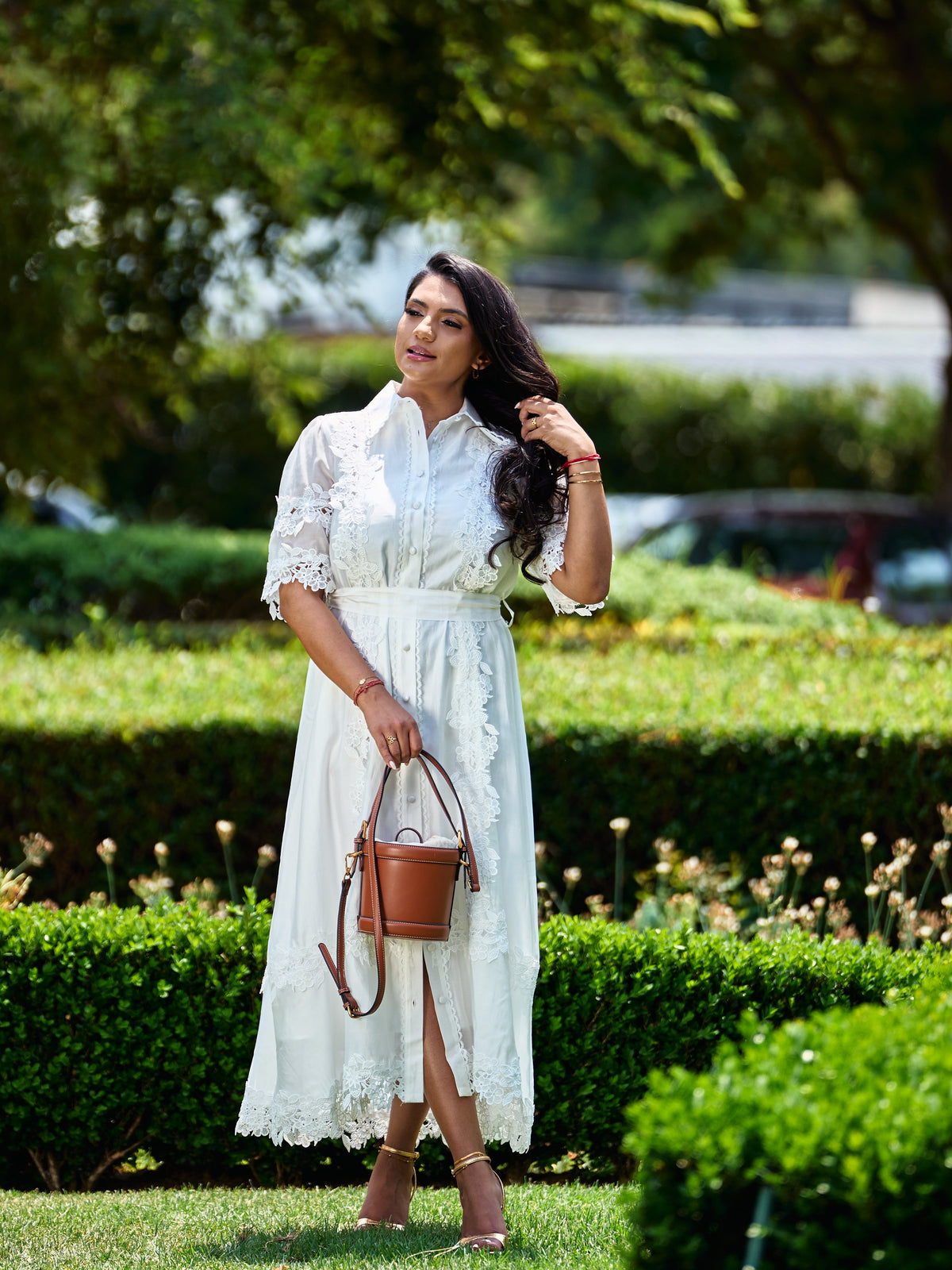 White lace shirt dress, three-quarter pose